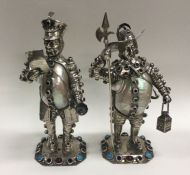 A rare pair of large silver and MOP figures decora