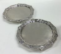 A rare pair of Georgian silver salvers with gadroo