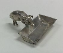 A novelty silver salt mounted with a pig eating fr