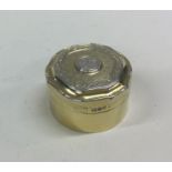 A good quality circular silver gilt pill box. Lond