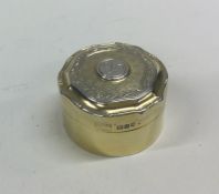 A good quality circular silver gilt pill box. Lond