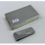 An engine turned silver match case together with a