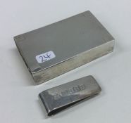 An engine turned silver match case together with a