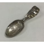 A silver 'This Little Piggy Went To Market' spoon.