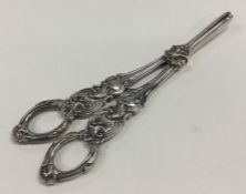 A good pair of silver plated grape scissors. Est.