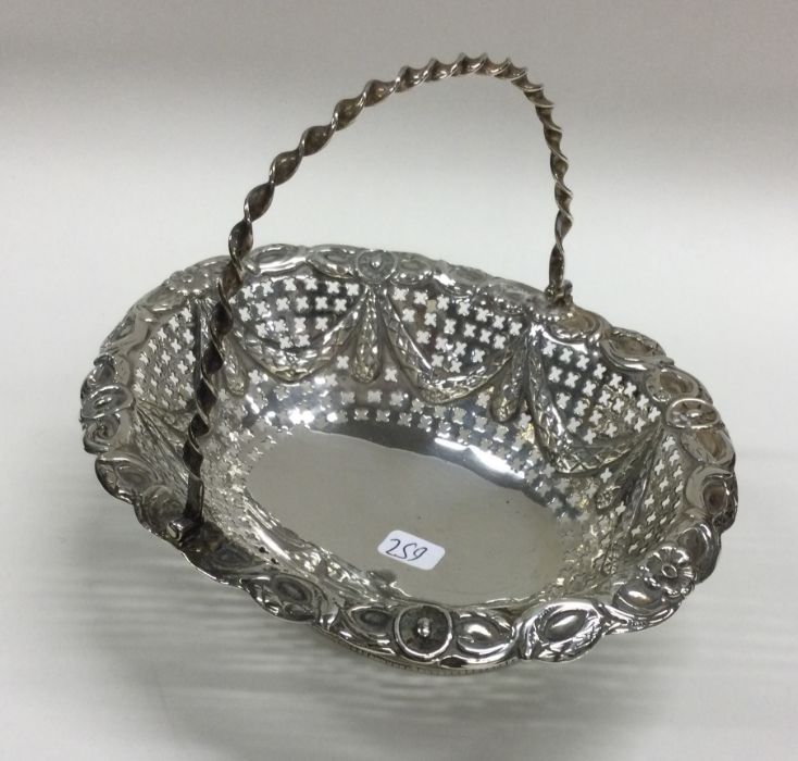 A good Georgian style Victorian silver basket with