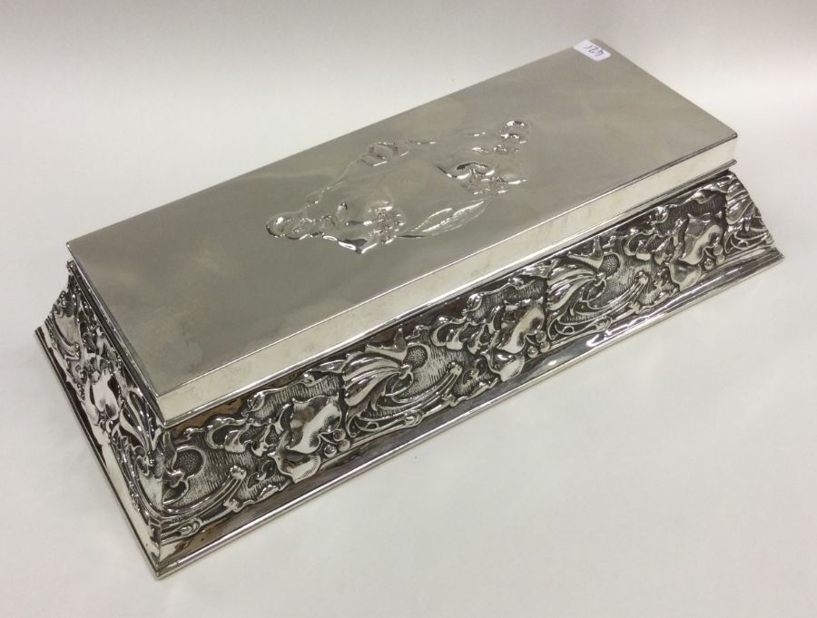 A large rectangular silver jewellery box of stylis