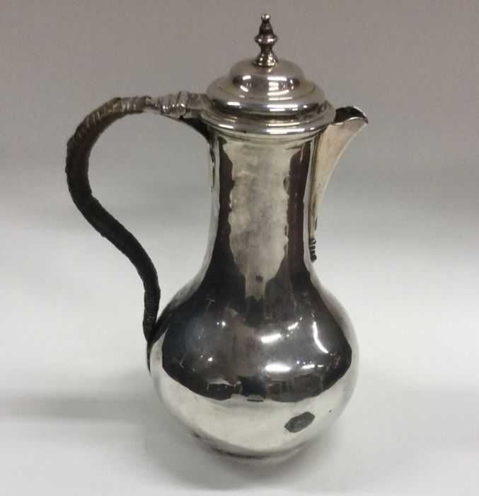 A heavy Georgian silver baluster shaped ewer with - Image 2 of 2