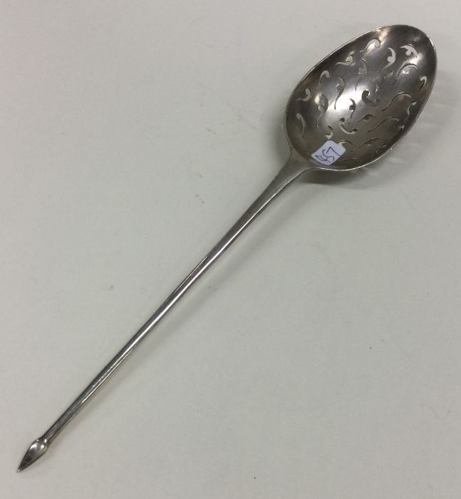 A substantial tapering silver mote spoon with pier