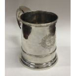 A good George II tapering silver tankard with cres