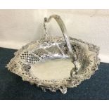 A fine Georgian style swing handled basket with pi