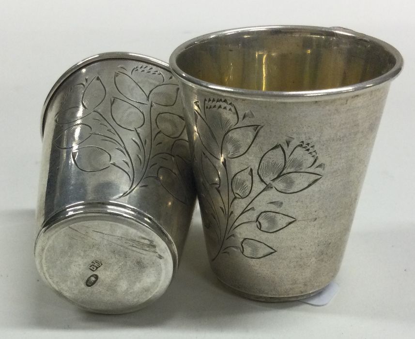 A pair of Russian silver tapering beakers engraved - Image 2 of 2