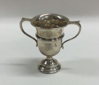 A small silver two handled trophy cup. Birmingham.