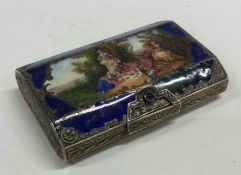 A Continental silver and enamelled pill box decora