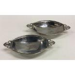 A pair of stylish silver shaped bonbon dishes. Bir