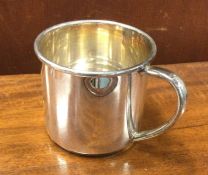 A Continental silver mug of typical form. Approx.