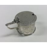 An attractive Victorian silver mustard pot with en