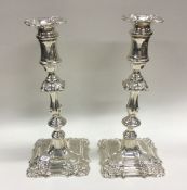 A good pair of Georgian style silver candlesticks