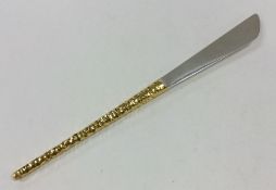 STUART DEVLIN: A stylish silver cake knife with te