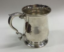 A good Georgian silver pint mug of tapering form.