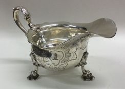 A good quality George II crested silver sauce boat