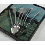 A collection of silver spoons together with an exp