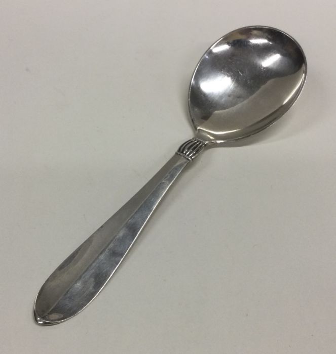 A large Continental silver spoon of tapering form.