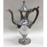 A large fine George III silver coffee pot with eng