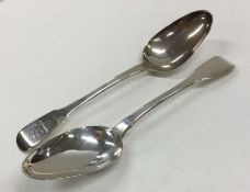 YORK: A pair of George III crested silver spoons.