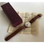 TUDOR ROLEX: A gent's 9 carat wristwatch on leathe