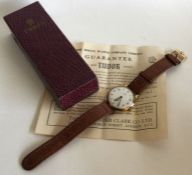 TUDOR ROLEX: A gent's 9 carat wristwatch on leathe