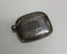 A shaped silver vesta case with hinged top and eng