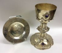 A rare silver gilt chalice together with matching