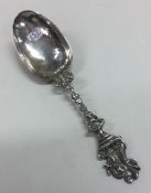A Continental silver spoon decorated with a romant