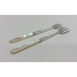 A good pair of tapering silver and MOP pickle fork