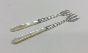 A good pair of tapering silver and MOP pickle fork