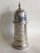 A good Edwardian silver lighthouse shaped sugar ca