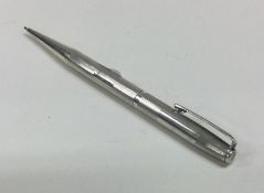 A good engine turned silver pencil. Approx. 29 gra