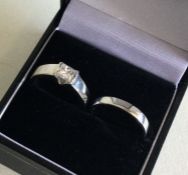 A good diamond princess cut single stone ring in p