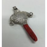 A cast silver 'Hey Diddle Diddle' child's whistle