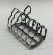 A heavy seven bar silver toast rack. Sheffield. By