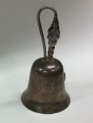 A good silver table bell of stylised form. Approx.