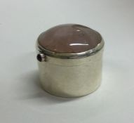 A modern silver and agate pill box with hinged lid
