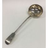 A large Victorian silver soup ladle. London 1858.