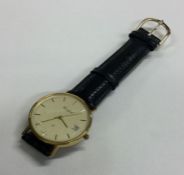 A gent's 9 carat Woodford wristwatch on leather st