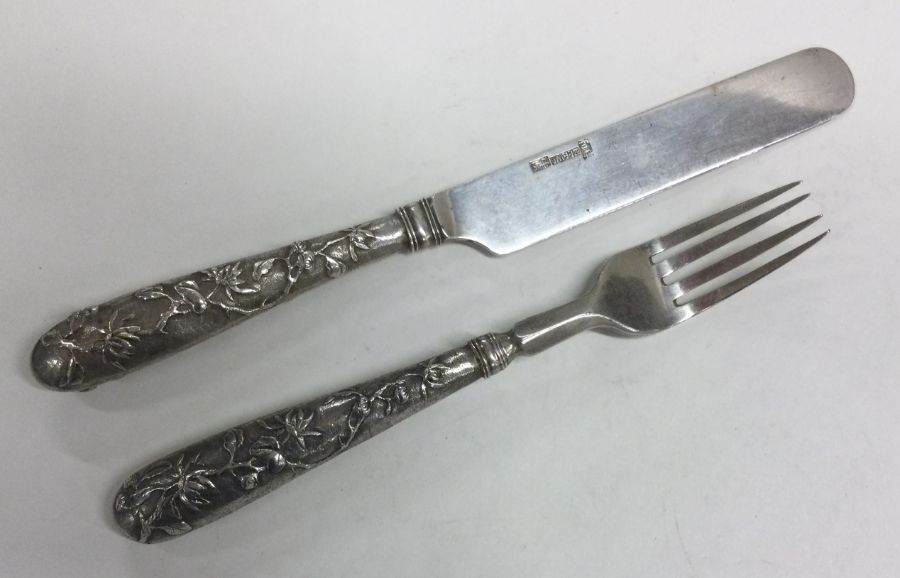 A good Chinese silver knife and fork set with tape - Image 2 of 3