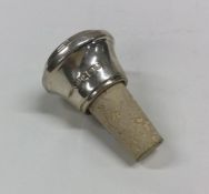 A silver mounted cork bottle stopper. Birmingham.