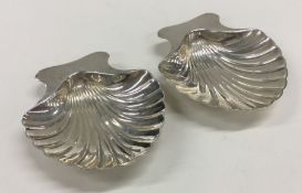 TIFFANY & CO: A pair of heavy silver butter shells