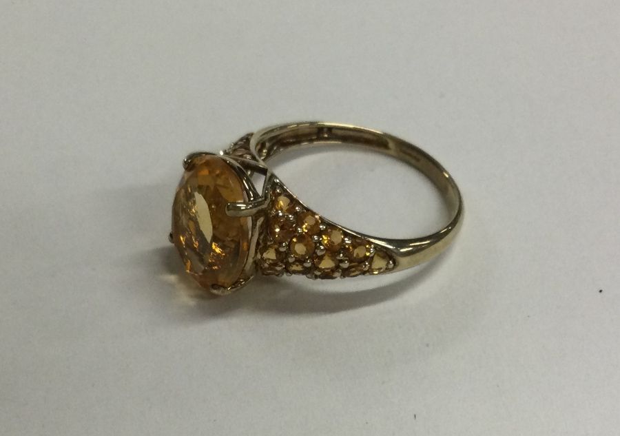 A 9 carat single stone ring in claw mount. Approx.