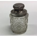 A heavy silver mounted dressing table jar with lif